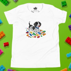 White youth t-shirt featuring a brick-built dachshund sitting among colorful building blocks from the Doxie Blocks collection.